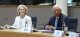 Two officials sit at a conference table with microphones and documents; the nameplate reads António Costa in front of them.