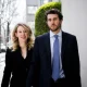 Elizabeth Holmes and Billy Evans walking together outdoors