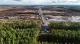 Aerial view of cleared forest land next to intact woodland in Finland