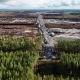 Aerial view of cleared forest land next to intact woodland in Finland
