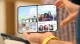 Hands holding an open foldable iPhone Duo showing its inner display
